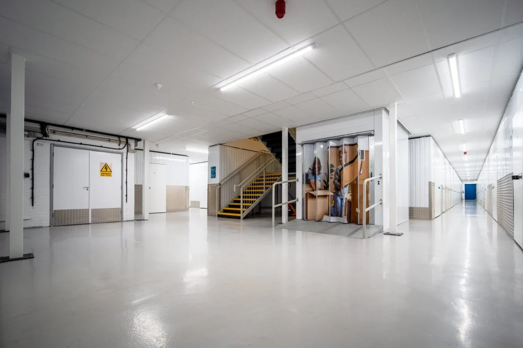Clean self-storage corridor maintained by Total Care Cleaning for Hills Self Storage
