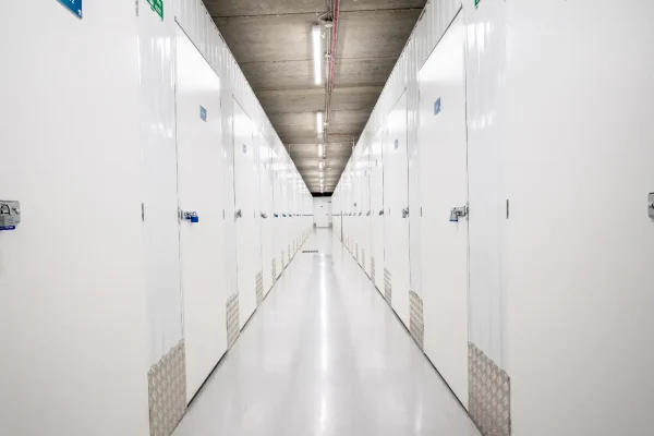 Clean self-storage corridor maintained by Total Care Cleaning for Hills Self Storage
