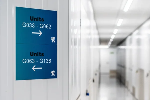 Clean self-storage corridor maintained by Total Care Cleaning for Hills Self Storage