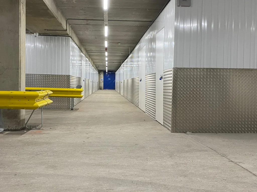Clean self-storage corridor maintained by Total Care Cleaning for Hills Self Storage