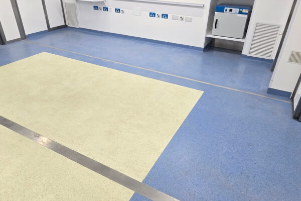 Detailed floor cleaning within a Vanguard Healthcare mobile clinical facility