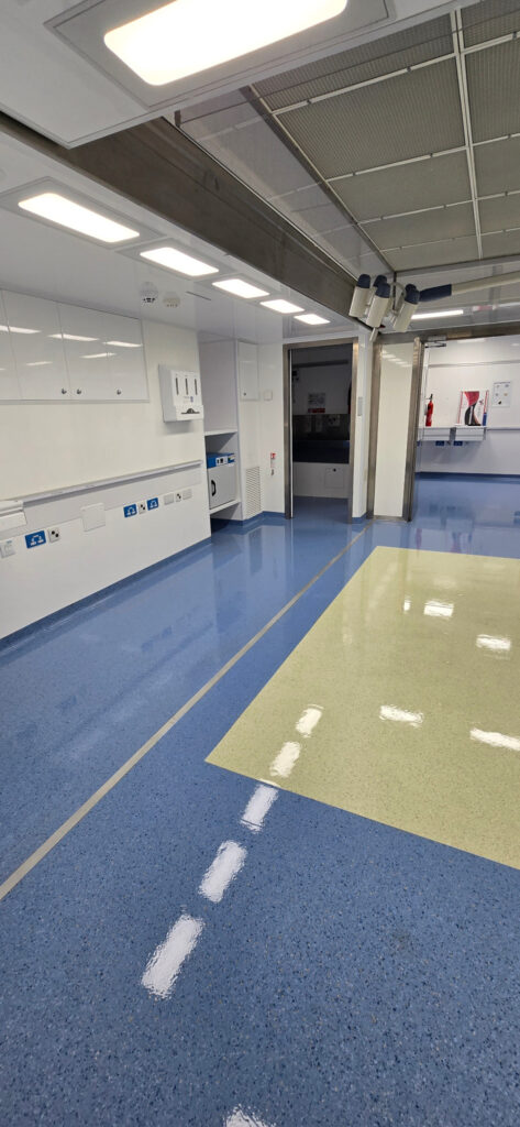 polished floor detail Polished clinical flooring after specialist cleaning in a mobile healthcare unit